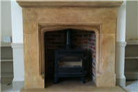 Limestone fireplace – ageing and finishing
